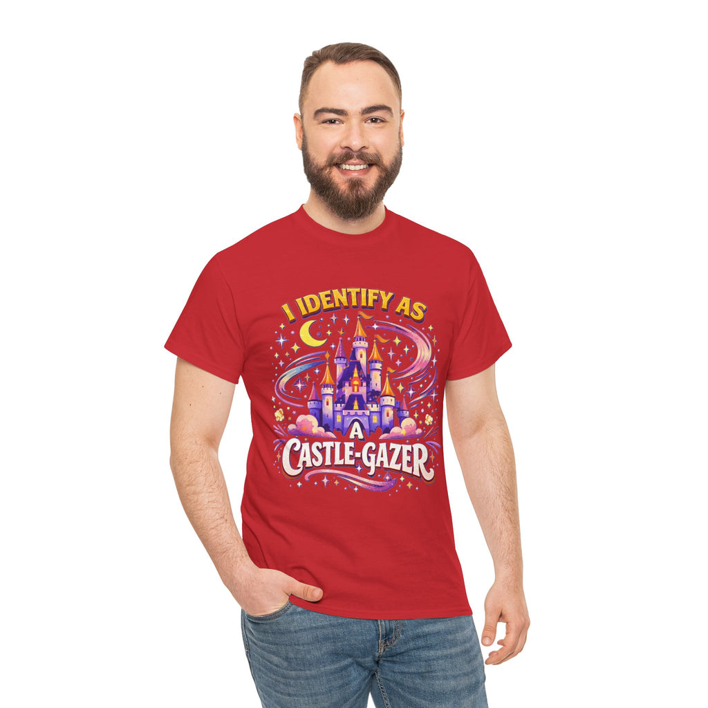 A man wearing a red graphic t-shirt with a colorful castle design and the text 'I IDENTIFY AS Castle-Gazer', paired with blue jeans, against a plain white background.