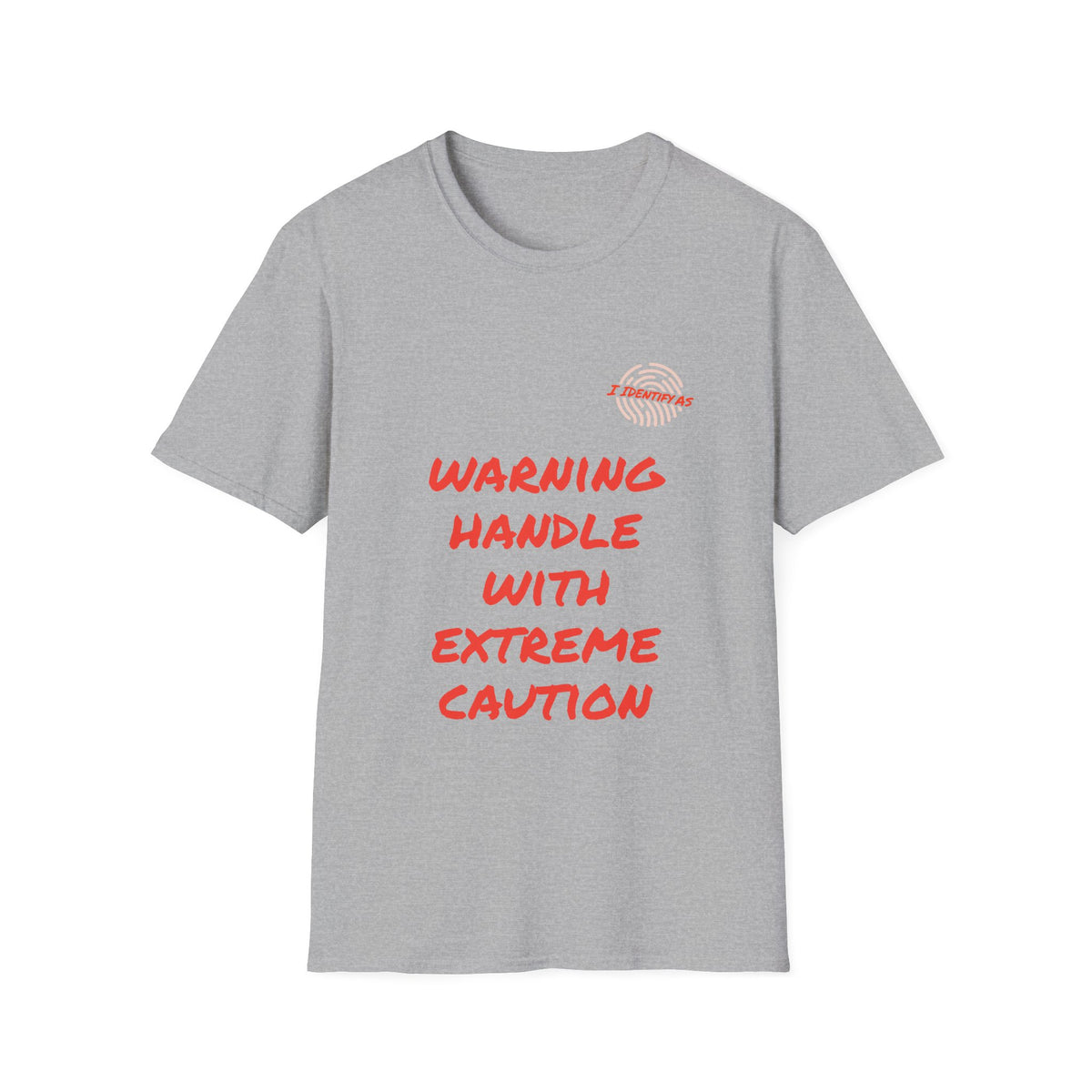 A light gray short‑sleeve crewneck T‑shirt with a bold orange stacked slogan reading WARNING HANDLE WITH EXTREME CAUTION across the front. A small I Identify As™ circular fingerprint logo sits above the text on the left chest. The design has a chaotic, expressive, personality‑driven feel that matches the brand’s humour‑led style.