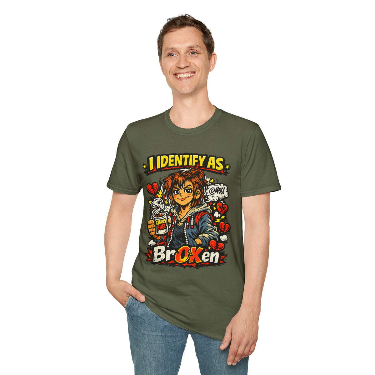 A man wearing an olive green graphic t-shirt with a cartoon character and the text 'I IDENTIFY AS Broken' from Chaos Clothing by I Identify As