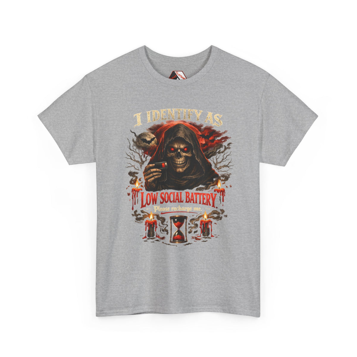A heather gray short-sleeve t-shirt with a graphic print of a grim reaper skull and the text 'I IDENTIFY AS LOW SOCIAL BATTERY' in red and gold, displayed on a clean white background.