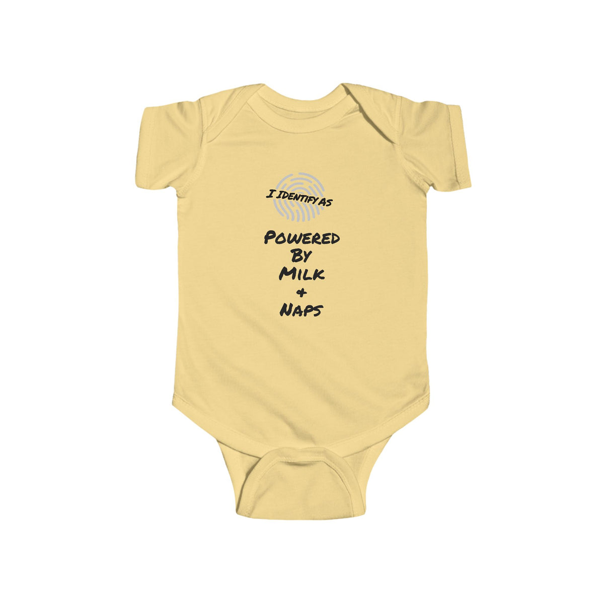 A pale yellow baby bodysuit with short sleeves and snap closures, featuring a graphic print on the chest that reads 'I IDENTIFY AS POWERED BY MILK + NAPS' with a small circular logo above the text.