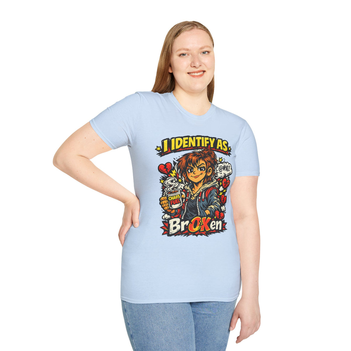 A woman modeling a light blue graphic t-shirt with a colorful anime-style print and the text 'I IDENTIFY AS Broken' from Chaos Clothing by I Identify As