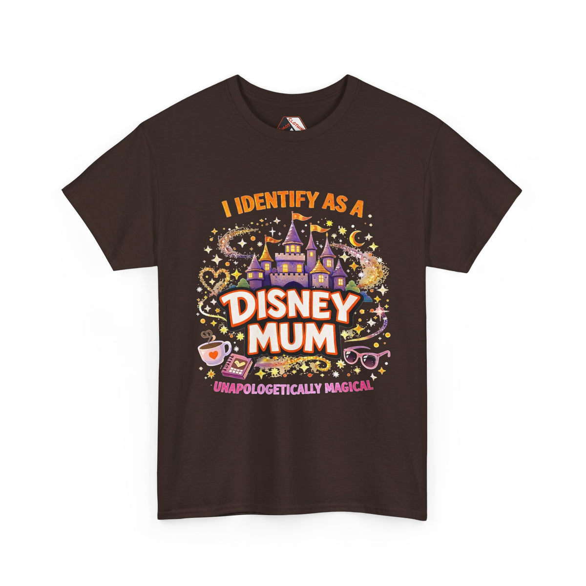 A dark brown short-sleeve t-shirt with a colorful graphic print on the front. The graphic features a purple castle, stars, a teacup, and the text 'I IDENTIFY AS A DISNEY MUM' and 'UNAPOLOGETICALLY MAGICAL'.