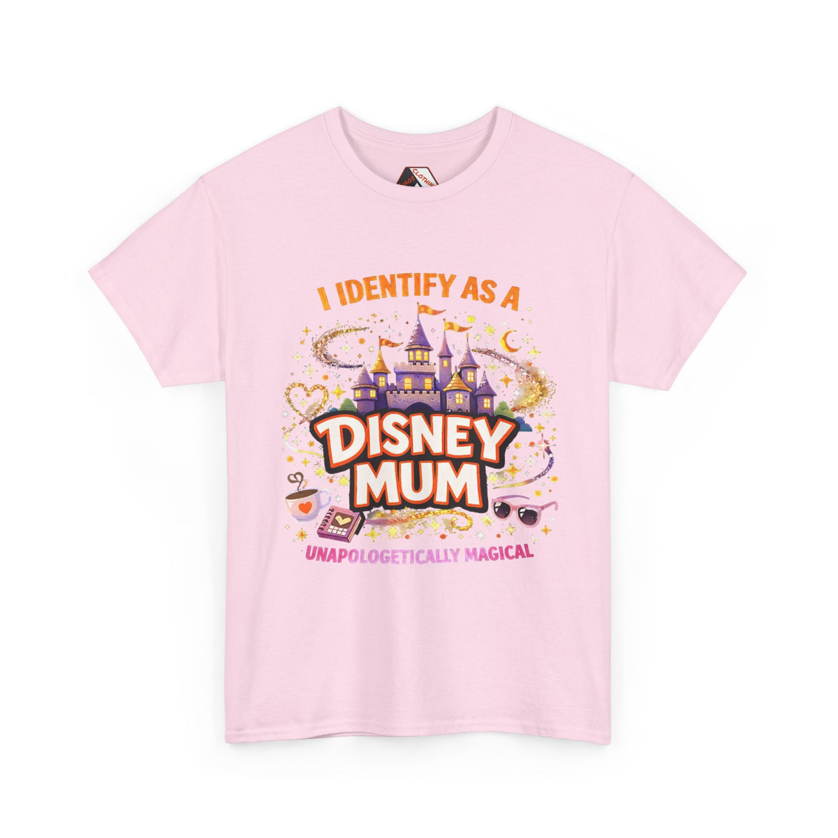 A light pink short-sleeve t-shirt with a colorful graphic print on the front. The graphic features a castle, the text 'I IDENTIFY AS A DISNEY MUM' in stylized lettering, and smaller text reading 'UNAPOLOGETICALLY MAGICAL'.