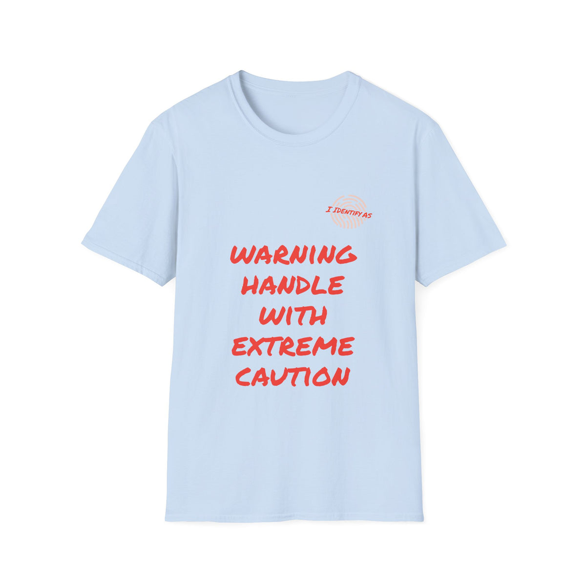 A light blue short‑sleeve crewneck T‑shirt with a bold orange stacked slogan reading WARNING HANDLE WITH EXTREME CAUTION across the front. A small I Identify As™ circular fingerprint logo sits above the text on the left chest. The design has a chaotic, expressive, personality‑driven feel that matches the brand’s humour‑led style.