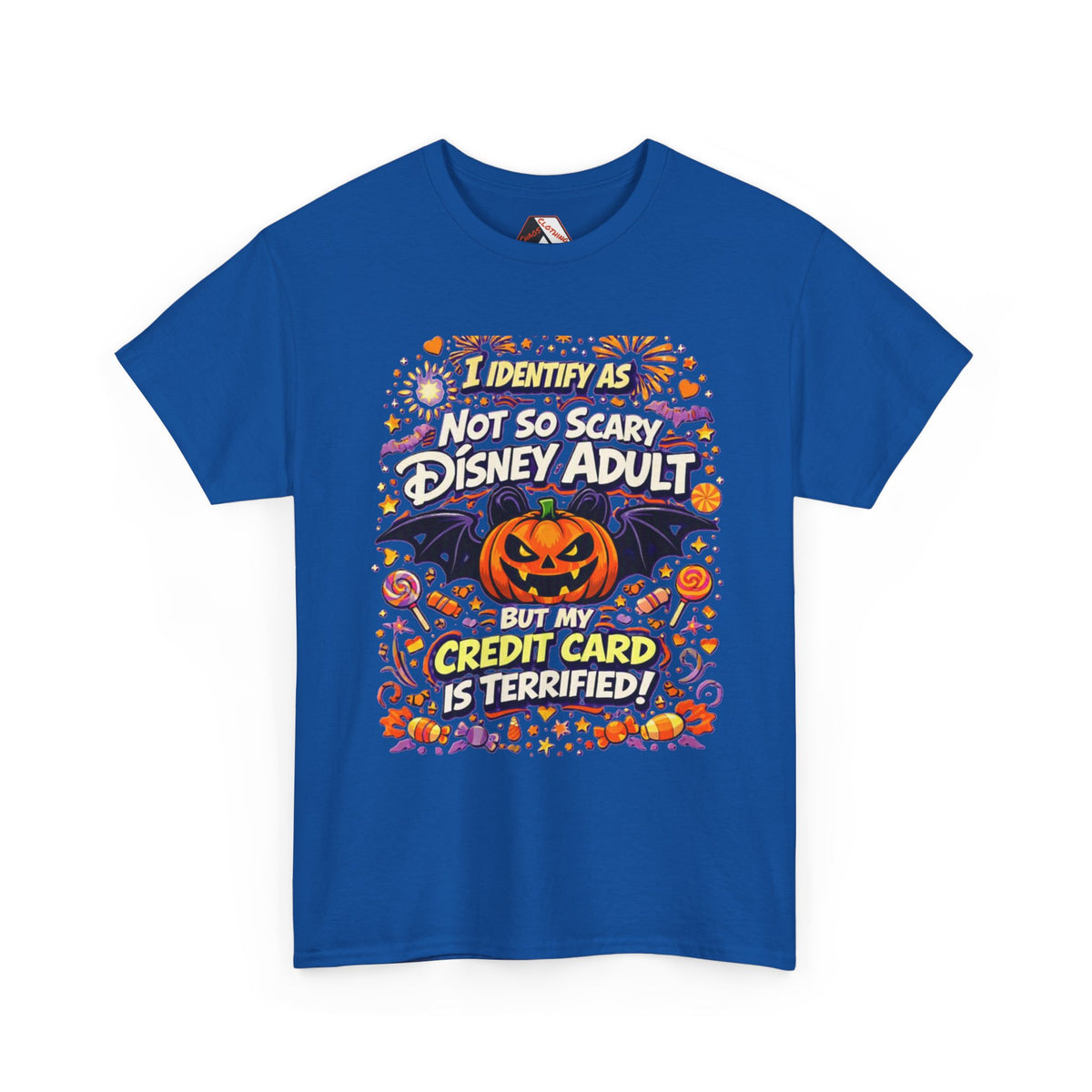 A royal blue short-sleeve crewneck t-shirt with a colorful graphic print on the front. The graphic features a jack-o'-lantern, bats, candy corn, and fireworks, with the text 'I IDENTIFY AS NOT SO SCARY DISNEY ADULT BUT MY CREDIT CARD IS TERRIFIED!' in stylized fonts.
